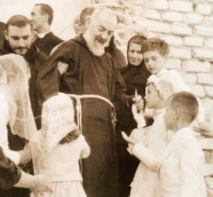 Saint Padre Pio with children